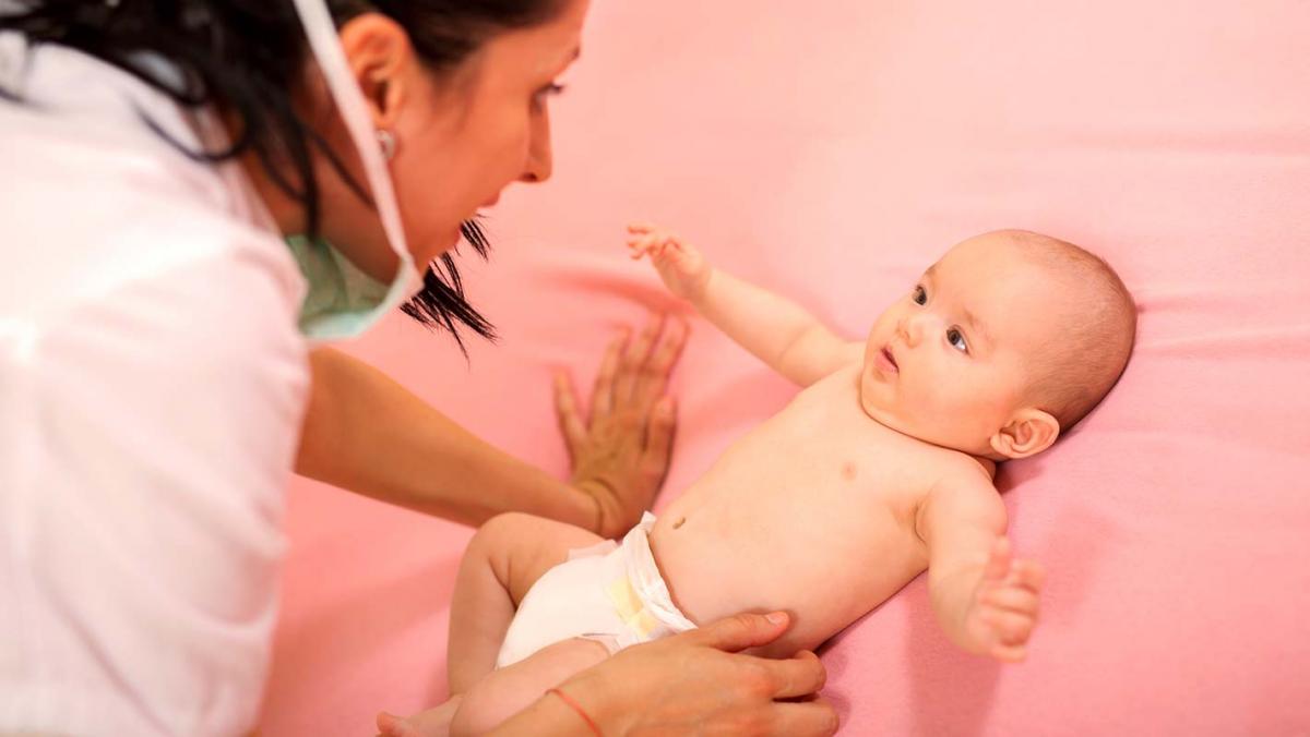 Doctor checking on a baby